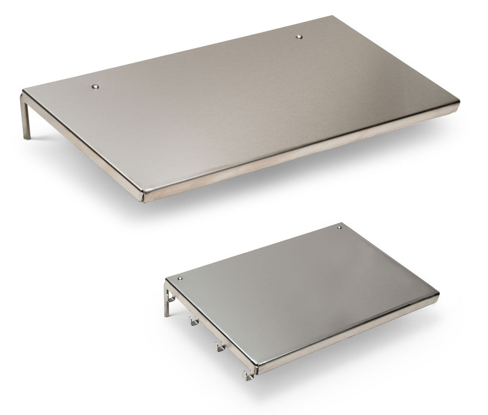 Stainless steel griddle top with removable flat cooking surface and folding legs for outdoor kitchen installation