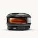 Arc off-black outdoor pizza oven with dome lid and front-facing window showing amber interior