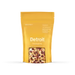 Yellow kraft paper bag with wood pellets visible through window, Detroit flavor BBQ smoking pellets