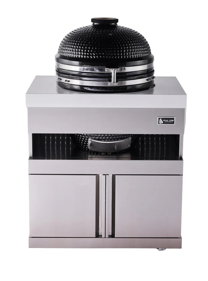 Black kamado grill with stainless steel bands on light gray outdoor kitchen base cabinet with two storage doors