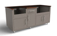 Gray outdoor kitchen module with dark wood top, multiple storage cabinets, center drawer, and open shelving sections