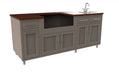 Modular outdoor kitchen with gray cabinets, dark wood countertop, sink with faucet, open grill space and storage