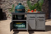 Big Green Egg outdoor kitchen island package with gray cabinetry, sink, and kamado grill base on stone patio